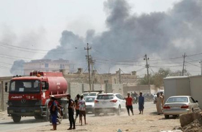 سقوط قتلى جراء حريق في مستودع أسلحة ببغداد