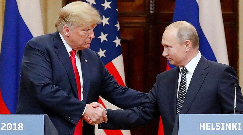 Mandatory Credit: Photo by ANATOLY MALTSEV/EPA-EFE/REX/Shutterstock (9762785o)
Donald J. Trump and Vladimir Putin
Russia US Summit in Helsinki, Finland - 16 Jul 2018
US President Donald J. Trump (L) and Russian President Vladimir Putin (R) shake hands during a joint press conference in the Hall of State at Presidential Palace following their summit talks, in Helsinki, Finland, 16 July 2018.